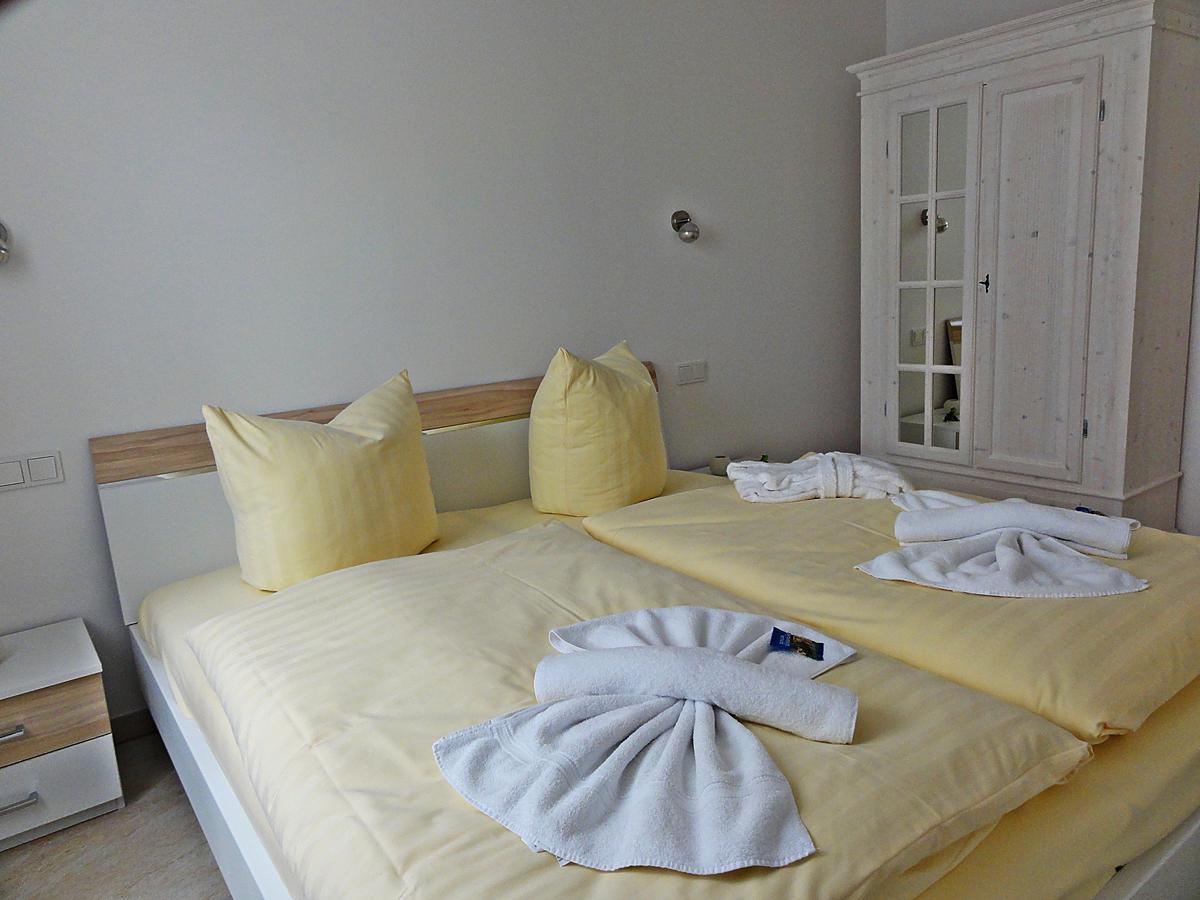 3 Zimmer Ferienwohnung Haus Meeresblick Mit Meerblick A005 Mit Suedterrasse Und Strandkorb Баабе Екстериор снимка